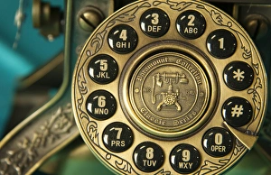 Close up absract of an old fashioned push-button home telephone Close up absract of an old fashioned push-button home telephone