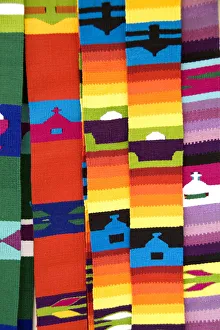 Close up of colorful fabrics and artwork shawls in Antigua Guatemala Close up of colorful fabrics and artwork shawls in Antigua Guatemala