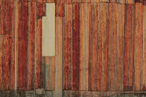 Close-up of rusted corrugated metal panels