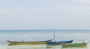 Colombia, San Bernardo Islands. Three small boats Colombia, San Bernardo Islands. Three small boats