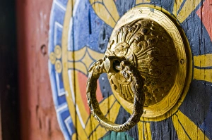 Colourful door knocker, Chimi Lhakhang, Bhutan Colourful door knocker, Chimi Lhakhang, Bhutan