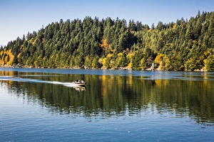 Columbia River Gorge Hood River, Oregon. Motor Speed Boat and Passengers glides fast Columbia River Gorge Hood River, Oregon. Motor Speed Boat and Passengers glides fast