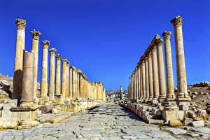 Corinthian Columns Ancient Roman Road City Jerash Jordan. Jerash came to power 300 BC to 100 AD Corinthian Columns Ancient Roman Road City Jerash Jordan. Jerash came to power 300 BC to 100 AD
