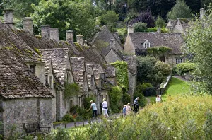 Cotswold stone cottages in the village of Bibury, Gloucestershire, England Cotswold stone cottages in the village of Bibury, Gloucestershire, England