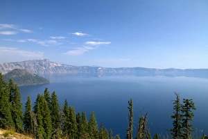 Crater Lake shrouded in smoke from forest fires in Crater Lake National Park located Crater Lake shrouded in smoke from forest fires in Crater Lake National Park located