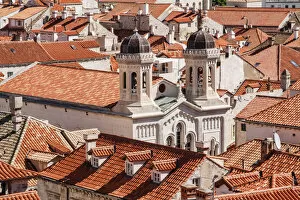 Balkan Peninsula Gallery: Croatia. Dalmatia. Dubrovnik. Church among red terra cotta tile roofs in the old town of