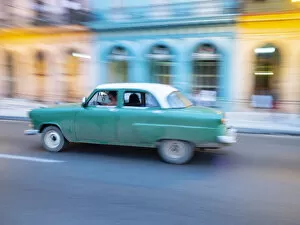 Caribbean Collection: Cuba, Havana, Havana Vieja, UNESCO World Heritage Site, classic car in motion