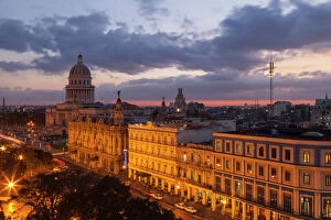 Center Gallery: Cuba, Havana. Twilight over the city with the capitol and other historical buildings