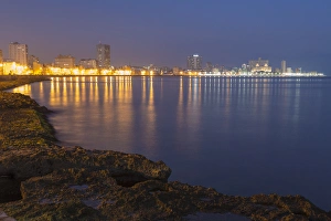 Cuba, Havana. View along the Malecon in pre-dawn Cuba, Havana. View along the Malecon in pre-dawn
