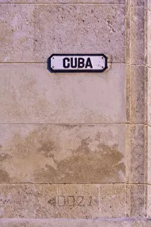 Cuba street sign on pink wall in Old Havana, La Habana Vieja, Cuba Cuba street sign on pink wall in Old Havana, La Habana Vieja, Cuba