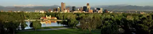 Denver skyline glistens in front of the Rocky Mountains Denver skyline glistens in front of the Rocky Mountains