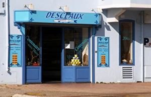 Desclaux Anchois anchovies factory and shop, house painted with advertising in blue Desclaux Anchois anchovies factory and shop, house painted with advertising in blue