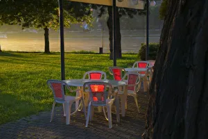 <b class=qtipBold><figcaption>Dining table and</figcaption></b><br>Dining table and chairs by the Danube River, Bratislava, Slovakia<br><em>© Keren Su / DanitaDelimont.com</em> Dining table and