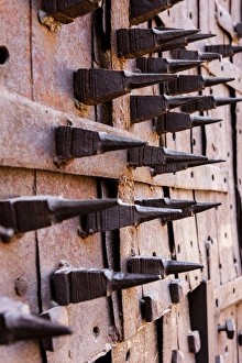 Door with spikes for defense against elephant attacks. 10th century. Jodhpur. Rajasthan Door with spikes for defense against elephant attacks. 10th century. Jodhpur. Rajasthan