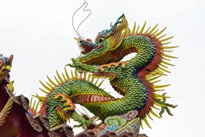 Dragon decoration on the roof in Lingxing Temple (Shibawang Gong Miao), Kaohsiung, Taiwan Dragon decoration on the roof in Lingxing Temple (Shibawang Gong Miao), Kaohsiung, Taiwan