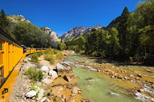 The Durango & Silverton Narrow Gauge Railroad on the Animas River, San Juan National Forest The Durango & Silverton Narrow Gauge Railroad on the Animas River, San Juan National Forest