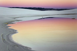 Dusk sky reflected in pool of water from recent rains, White Sands National Monument Dusk sky reflected in pool of water from recent rains, White Sands National Monument