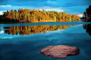 Images Dated 7th November 2011: Early Evening reflections in the boundry waters of Minnesota-Ontario
