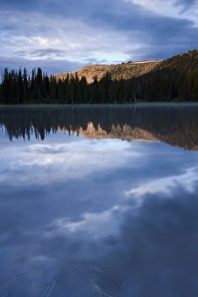 Early light hits Haystack Mountain and is reflected in a mountain lake - Uinta Mountains Early light hits Haystack Mountain and is reflected in a mountain lake - Uinta Mountains