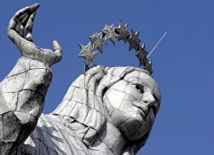 Ecuador, Quito. The Virgin of Panecillo watches over the capitol of Ecuador against a blue sky Ecuador, Quito. The Virgin of Panecillo watches over the capitol of Ecuador against a blue sky
