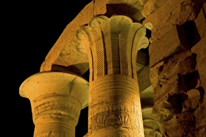 Egypt, Kom Ombo. Illuminated pillars of Kom Ombo Temple dedicated to two Egyptian gods: Sobek Egypt, Kom Ombo. Illuminated pillars of Kom Ombo Temple dedicated to two Egyptian gods: Sobek