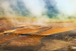 Elevated view of Grand Prismatic spring and colorful bacterial mat, Yellowstone National Park, Wyoming Elevated view of Grand Prismatic spring and colorful bacterial mat, Yellowstone National Park, Wyoming