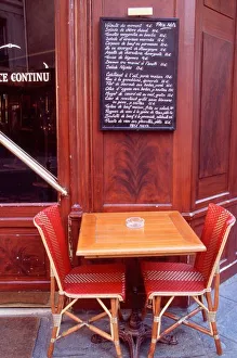 EU, France, Paris. Two chairs in front of a Parisian bistro EU, France, Paris. Two chairs in front of a Parisian bistro