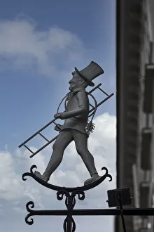 Europe, Austria, Vienna, Store Sign for a Chimney Sweep Europe, Austria, Vienna, Store Sign for a Chimney Sweep