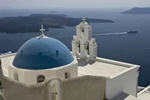 Aegean Sea Gallery: Europe, Greece, Santorini. Greek Orthodox church and white bell tower overlook a luxury yacht