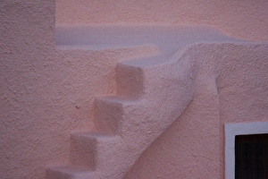 Europe, Greece, Santorini, Thira, Oia. Pink stucco wall and staircase. Credit as Europe, Greece, Santorini, Thira, Oia. Pink stucco wall and staircase. Credit as