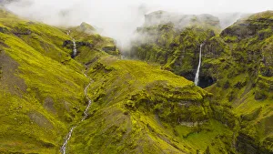 Europe, Iceland. Aerial view of Mulagljufur canyon with the waterfalls Hangandifoss Europe, Iceland. Aerial view of Mulagljufur canyon with the waterfalls Hangandifoss