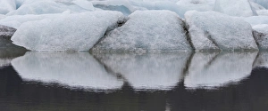 Europe, Iceland. Fjallsjokull Glacier reflects patterns in water Europe, Iceland. Fjallsjokull Glacier reflects patterns in water