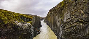 Europe, Iceland. Panoramic aerial view of the basalt columns lining the Studlagil river Europe, Iceland. Panoramic aerial view of the basalt columns lining the Studlagil river