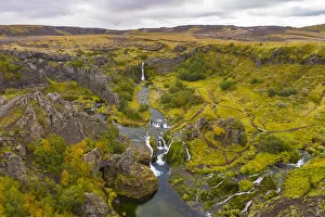 Europe, Iceland. Panoramic aerial view of Gjain waterfalls in a tranquil Europe, Iceland. Panoramic aerial view of Gjain waterfalls in a tranquil