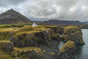 Europe, Iceland. View of the volcanic coastline of Arnarstapi on the Snaefellsnes Europe, Iceland. View of the volcanic coastline of Arnarstapi on the Snaefellsnes