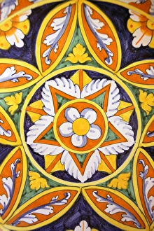 Europe, Italy. Traditional hand-painted glazed ceramic dish Europe, Italy. Traditional hand-painted glazed ceramic dish