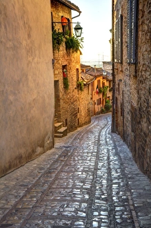 Europe; Italy; Umbria; Spello; Colored Buildins along a Back Street of Spello Europe; Italy; Umbria; Spello; Colored Buildins along a Back Street of Spello