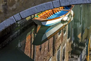 Europe, Italy, Venice. Boat underneath bridge Europe, Italy, Venice. Boat underneath bridge