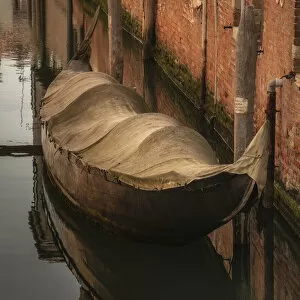 Jim Nilsen Gallery: Europe, Italy, Venice. Covered old gondola on canal