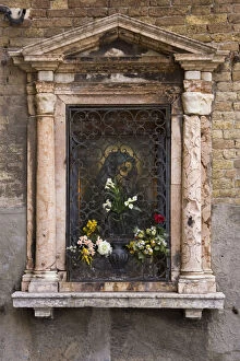 Images Dated 19th March 2005: Europe, Italy, Venice. Devotional niche to Virgin Mary on street wall. Credit as