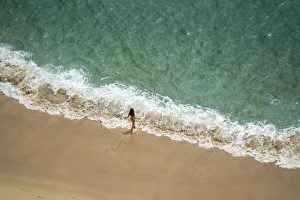 Jim Nilsen Gallery: Europe, Portugal, Nazare. Girl in surf on beach
