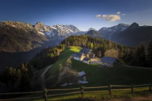 Images Dated 28th April 2012: Europe, Slovenia, Logarska Dolina. Mountain farm houses at sunset