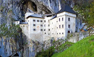 Europe, Slovenia, Predjama Castle. Castle built into mountain wall Europe, Slovenia, Predjama Castle. Castle built into mountain wall