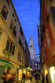 Evening street scene with Bell Tower in background, Venice Italy Evening street scene with Bell Tower in background, Venice Italy