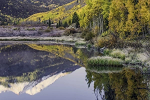 Fall colors and Red Mountain reflected on Crystal Lake at sunrise, near Ouray, Colorado Fall colors and Red Mountain reflected on Crystal Lake at sunrise, near Ouray, Colorado