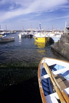 A fishing boat on the Isle of Capri in Capritown, Italy