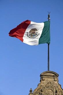 The Flag of Mexico atop the National Palace in Mexico City, Mexico The Flag of Mexico atop the National Palace in Mexico City, Mexico