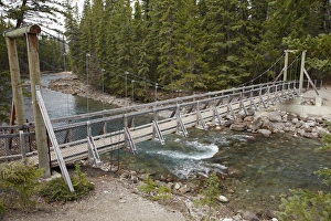 Footbridge across Maligne River, Jasper National Park, Alberta, Canada Footbridge across Maligne River, Jasper National Park, Alberta, Canada