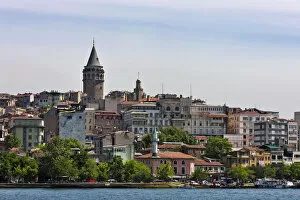 Images Dated 10th September 2018: Galata Tower and houses along the waterfront. Golden Horn, Istanbul, Turkey