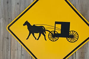 Images Dated 4th August 2014: Geauga County, Mesopotamia. Amish carriage caution road sign